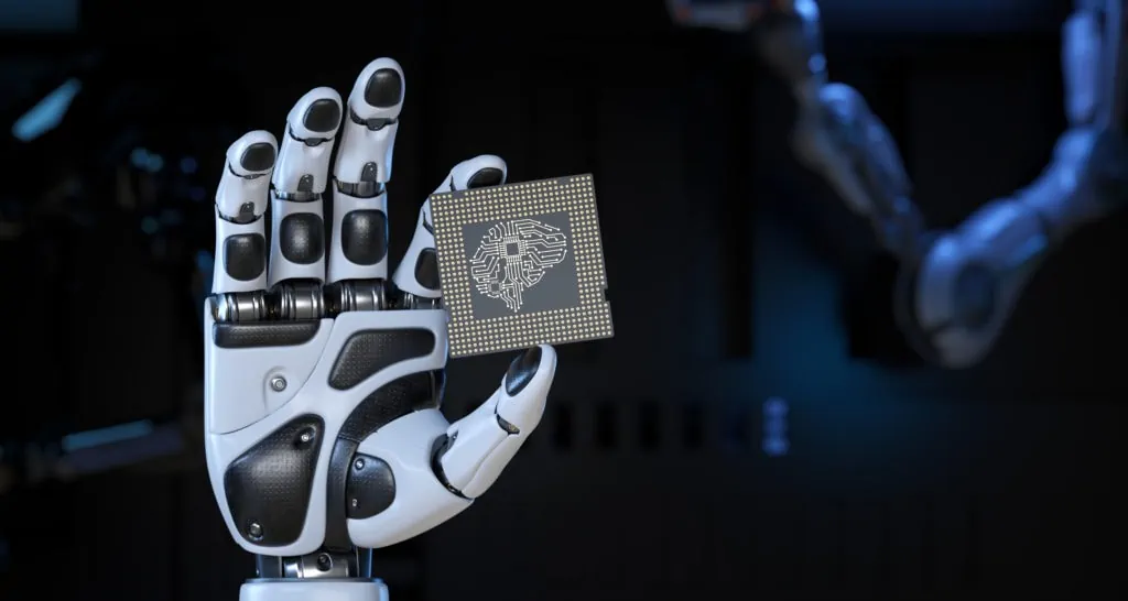 Roboterhand, die eine Computerprozessoreinheit mit künstlicher Intelligenz hält.